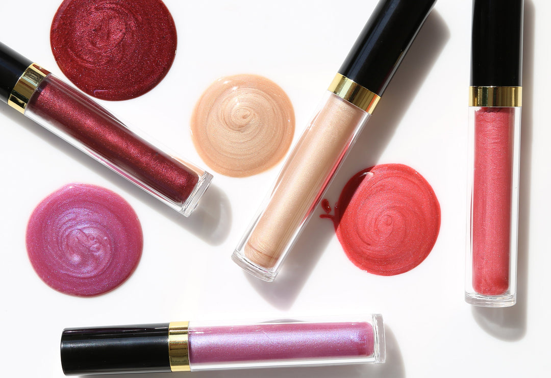 Four Perfect Skin Conditioning Lip Glosses with cosmetic bag